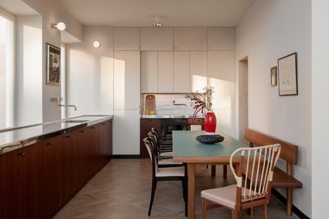 Red Ceiling, Stockholm Apartment, Wood Dining Room Table, Stainless Steel Handrail, Blue Ceilings, Travertine Floors, Apartment Renovation, Living Room Ceiling, Charlotte Perriand