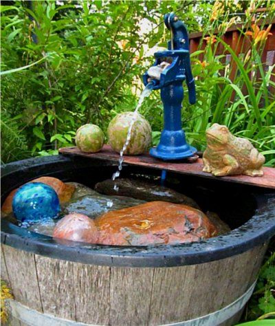 Decorate Your Garden With Water Fountains | Sierra News Online Old Well Pump Ideas Water Features, Pitcher Pump Ideas, Homemade Water Fountains, Old Water Pumps, Container Water Gardens, Home Fountain, Flea Market Gardening, Diy Garden Fountains, Pond Pumps