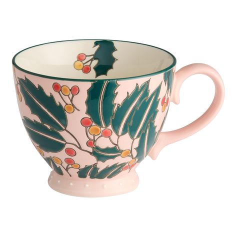 You'll love the Pink and Green Holly Hand Painted Ceramic Mug at World Market. Browse our entire collection of Christmas Mugs, available online or at one of our 270+ stores. Painted Ceramic Mug, Christmas Pottery, Christmas Ceramics, Holiday Mugs, Painted Mugs, Hand Painted Ceramic, Tea Blends, Stoneware Mugs, World Market