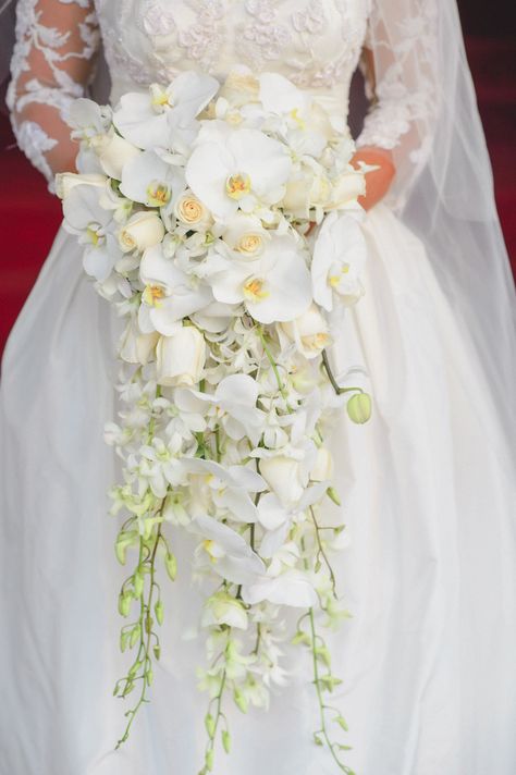 All-white bouquet | Photography: Ulysses Photography - ulyssesphotography.com  Read More: http://www.stylemepretty.com/2015/03/24/black-tie-nyc-wedding-at-the-harvard-club/ Orchid Bridal Bouquets, Orchid Bouquet Wedding, Cascading Bridal Bouquets, Bouquet Photography, Cascading Wedding Bouquets, Orchid Bouquet, Bridal Bouquet Flowers, Orchid Wedding, Cascade Bouquet