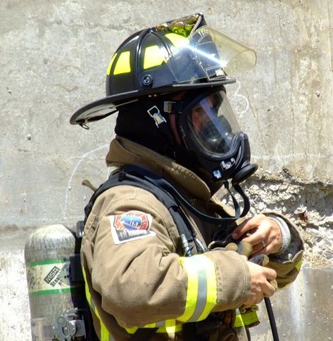 A self-contained breathing apparatus , or SCBA , sometimes referred to as a compressed air breathing apparatus (CABA), or simply breathing apparatus (BA), is a device worn by rescue workers, firefighters , and others to provide breathable air in an "Immediately Dangerous to Life or Health" atmosphere ( IDLH ). Different Types Of Face, Breathing Apparatus, Types Of Face Masks, Rescue Workers, Breathing Problems, World Health Organization, Protective Clothing, Photo Mask, People Around The World