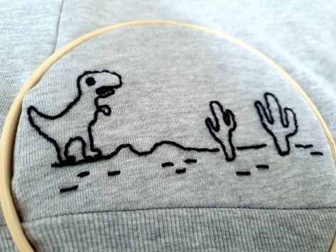 #Embroider #dino #T-rex #simple Dinasour Embroidery Easy, T Rex Embroidery, Dino Embroidery, Embroidery Simple, Embroidery Crewneck, Embroidery Ideas, Embroidery And Stitching, T Rex, Hand Embroidery