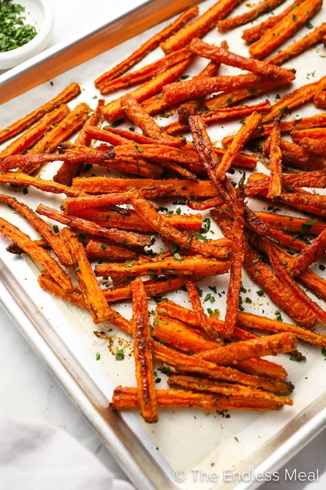 Have you ever tried carrot fries? If not, you need to! They're an easy-to-make, delicious, and healthy side dish. Seasoned to perfection, the sweetness of the carrot amplifies as the natural sugars caramelize, and the outside becomes crispy and delicious while the inside stays soft. Carrot fries are a healthy recipe that feels like a treat! #theendlessmeal #carrots #carrot #carrotfries #fries #sidedish Parmesan Roasted Carrot Fries, Crispy Carrot Fries, Carrot Fries Recipe, Roasted Carrot Fries, Carrot Fries Baked, Yam Fries, Carrot Fries, Roasted Carrot, Baked Carrots