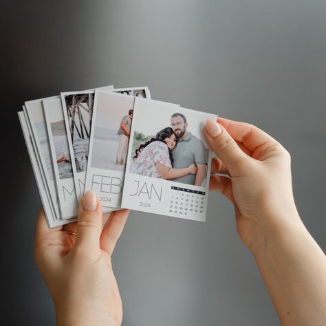 Transform your fridge into a gallery of cherished memories with our Custom Photo Magnetic Calendar! The perfect gift for yourself or your friends, this unique item allows you to display 12 of your favorite photos stylishly and practically. Key Features: * PERSONALIZED DESIGN: Choose 12 of your best photos to create a year-round memories display. * High-Quality Printing: We ensure each photo shines with clarity and color on durable magnet sheets. * Gift-Ready Packaging: Our calendars come in beau Fridge Magnet Packaging, Diy Photo Magnets, Gifts Using Photos, Magnet Calendar, Photo Packaging, Custom Photo Magnets, Fridge Decor, Unique Calendar, Magnetic Calendar