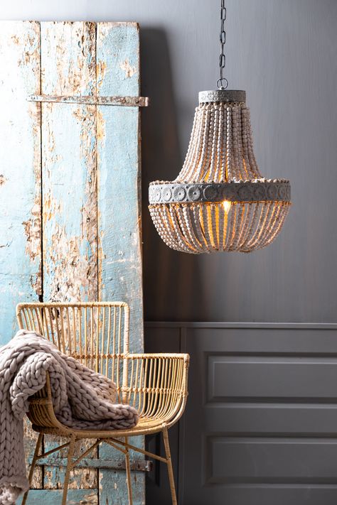 For a timeless statement piece to suspend above your face, look no further than the Luna Ceiling Light. Supported by two bands of metal with floral detailing, it features numerous strings of beads which cascade downwards in a beautiful display of fluidity. It is finished in off-white for a charming, aged aesthetic that radiates character. It will look absolutely wonderful as it fills your space with its luxuriously warm light. In a rustic living room or a traditional dining room, the Luna Ceilin Wooden Bead Chandelier, Dutch Home, Traditional Dining Room, Hanging Chandelier, White Chandelier, Led Stripes, Traditional Chandelier, Beaded Chandelier, Large Chandeliers