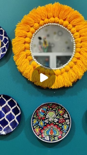 Colourful Pitara by Priyanka Porwal on Instagram: "Diy wall mirror.❤️
I have used a cake base , mirror, some beads and handmade tassels to make this diy.
Hop on to my previous reels to see how the tassels are made. For this I had made 30 tassels🤪

#diyhomeprojects #diyhome #diyvideos #diydecor #homedecorlovers #jiscovery #hobbiesindia #thefestivaltale#craftideas #mykindofplace #myhomevibes #happy #celebratelife #celebrations #diy #reelsinstagram #trending #reelsvideo #doityourself #keepcreating #artistsoninstagram #artoftheday #artgallery #keepsupporting✌🎀" Diy Wall Mirror, Cake Base, Diwali Party, Instagram Diy, Diy Videos, Diy Wall, Celebration Of Life, Wall Mirror, Art Day