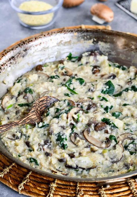 This Mushroom Risotto with Cauliflower Rice has a rich creamy sauce and an umami mushroom taste that's as warm and comforting as traditional risotto. It's just as easy to make but it's grain free and full of nutrient rich vegetables.  A paleo, gluten free recipe with a vegan option and Whole30 compliant. Cauliflower Rice With Mushrooms, Creamed Vegetables, Traditional Risotto, Creamy Mushroom Risotto, Cauliflower Rice Risotto, Cauliflower Risotto, Gluten Free Recipe, Mushroom Risotto, Tasty Vegetarian Recipes