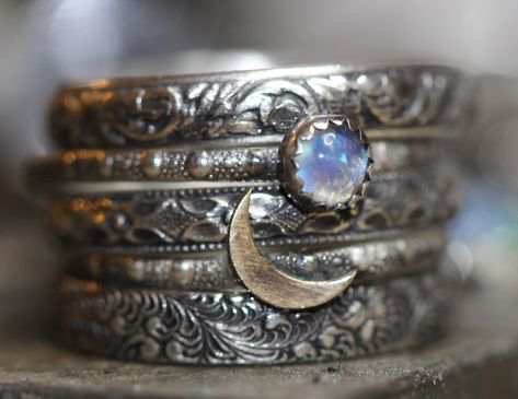 Five mysterious solid sterling silver rings. One ring features a gorgeous tiny 4mm rainbow moonstone set in a serrated silver bezel.   Another ring features a beautiful 14kt gold filled crescent moon.   Three more additional patterned solid sterling rings, just as pictured. Any size Other variations/combinations possible, please ask. IMPORTANT SIZING NOTE: If you plan to wear multiple rings at once, please consider sizing up 1/2 size for the most comfortable fit. Sterling Rings, Multiple Rings, Sterling Silver Stacking Rings, Stacking Ring Set, Witchy Jewelry, Pattern Ring, Silver Stacking Rings, Garnet Rings, Moonstone Ring