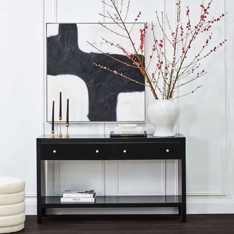 Absolutely love the combination of satin black finish and brushed gold handles. 😍✨ #indoor #indoorfurniture #furniture #consoletable #table #livingroom Adele Home, Fluted Drawers, Gold Sphere, Interior Design News, Black Console Table, Monochromatic Palette, Painting Medium, Oval Table Dining, Oil On Canvas Painting