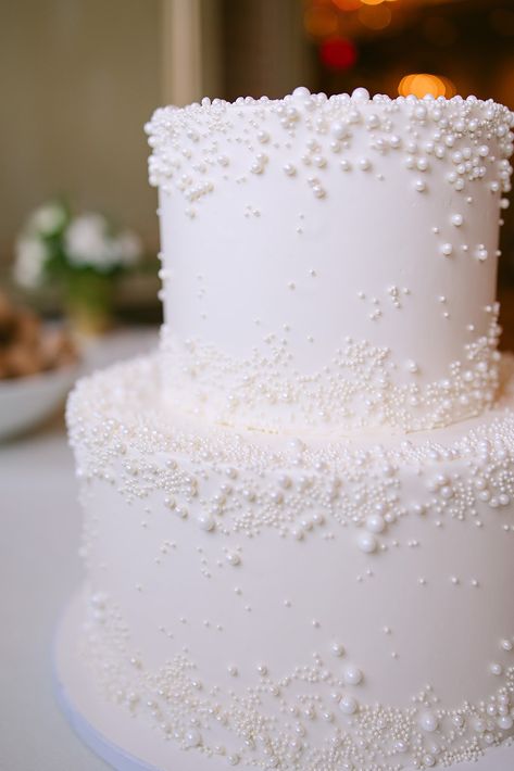 pearl wedding cake simple Wedding White Cake Elegant, Pearl Wedding Ideas Decor, Good Ideas For Weddings, Two Tier Pearl Cake, Cake For Wedding Ideas Simple, Wedding Cake Designs No Flowers, Two Tier Wedding Cakes Elegant Romantic, Two Tier Pearl Wedding Cake, Wedding Cakes Pearls And Flowers