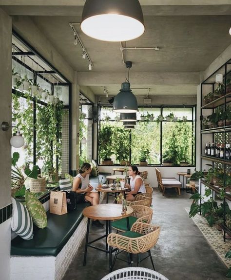 Coffee Shop With Plants Interior Design, Coffee Shop Plants Decor, Earthy Cafe Interior Design, Plant Cafe Interior, Coffee And Plant Shop, Greenhouse Coffee Shop, Indoor Garden Cafe, Coffee Shop With Plants, Garden Cafe Design