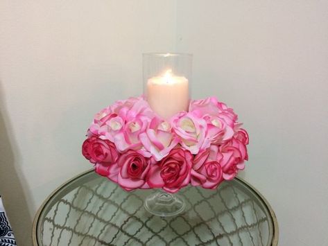 I created a Valentine's Day candle holder centerpiece using pink roses and heart picks.  This could be used as a wedding centerpiece or on a Valentine's Day table. It's very inexpensive and it was a lot of fun to make. Diy Valentine Centerpieces, Heart Shaped Crayons, Dollar Tree Centerpieces, Dry Floral Foam, Candle Holder Centerpiece, Tree Centerpiece, Centerpiece Diy, Valentine Centerpieces, Crayon Crafts