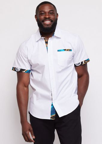 Style#M2067WSBF Comfort, cool and color! D’IYANU’s Salim short sleeve shirt for men moves easily in cool white with the sky blue... Ankara Shirt For Men Short Sleeve, Ankara Shirts For Men, Sky Blue Flowers, Wedding Asoebi, Men African Wear, Modern African Clothing, African Wear For Men, Dashiki For Men, African Print Tops