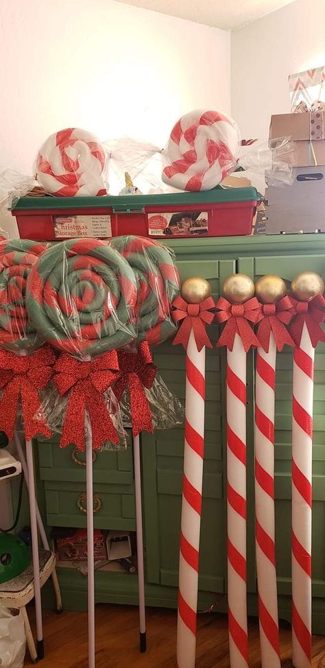 Large Peppermint Candy Decorations, Christmas Outdoor Candyland, Candy Cane Christmas Float Ideas, Toy Shop Decoration Ideas, Candy Cane Columns, Let It Snow Parade Float Ideas, Peppermint Lane Decorations, Christmas Parade Float Themes, Christmas Carnival Decor