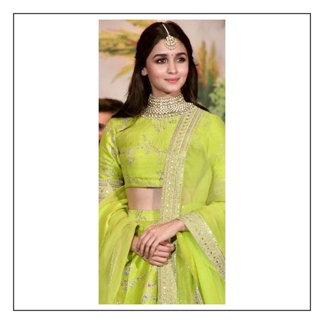 Ms. Alia Bhatt @aliaabhatt paints a pretty picture in a fluorescent green lehenga in silk and organza. The ensemble is hand-embroidered with floral motifs in delicate silver thread-work and complemented with a statement choker and maang-tika from the Sabyasachi Heritage Jewelry collection. Image source: @voompla Styled by: @stylebyami and @shnoy09 #Sabyasachi #AnEndlessSummer #SpringSummer2018 #SS18 #SabyasachiJewelry #TheWorldOfSabyasachi #AliaBhatt Alia Bhatt Sabyasachi, Parrot Green Lehenga, Indian Outfits Modern, Green Lehenga Choli, Sabyasachi Mukherjee, Lehenga Saree Design, Latest Bridal Lehenga, Wedding Lehenga Designs, Lehenga Designs Simple