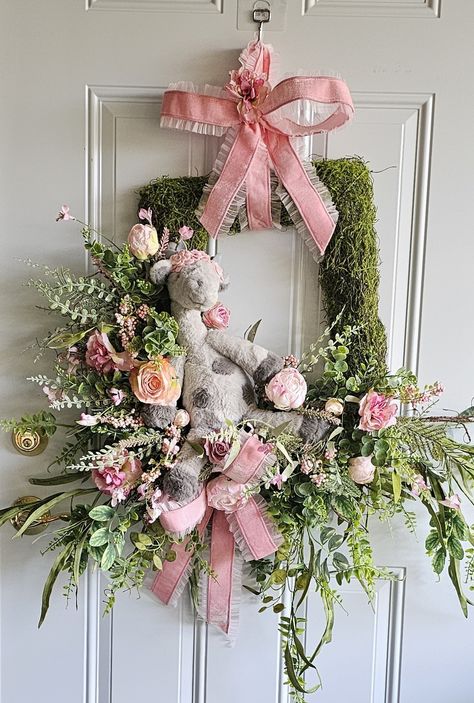 🌸👶 Celebrate Parent Appreciation Day with these adorable baby wreaths, perfect for adding a touch of sweetness to any nursery. Each wreath features a cuddly plush toy and beautiful floral arrangements, making them ideal gifts for new parents or a lovely addition to your own home decor. Did you know Parent Appreciation Day was established in 1994 to recognize the important role parents play in our lives? It's a day to honor and appreciate the love, care, and sacrifices parents make every day.... Baby Shower Front Door, New Baby Wreath, Easter Front Door Wreath, Easter Front Door, Birthday Wreath, Floral Door Wreaths, Baby Wreath, Welcome Home Baby