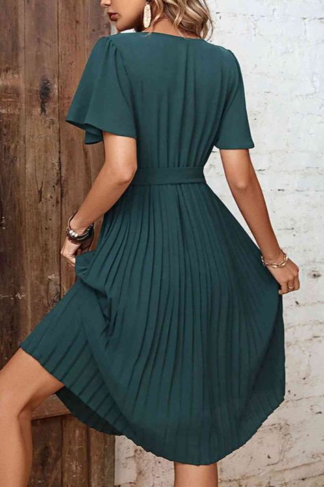 🌸 Spring into style with Buttoned V-Neck Flutter Sleeve Pleated Dress from TRENDMELO! 🌸 Shop now at https://trendmelo.com/products/buttoned-v-neck-flutter-sleeve-pleated-dress and embrace the latest spring trends on https://trendmelo.com . Explore and shop women's trendy clothing and fashion accessories today. #Trendmelo #SpringFashion #SpringStyle #SpringTrends #SpringOutfits #OOTD #womensfashion #womenswear #womensdresses #fashionwoman #fashionlover #fashionista #fashionnova #fashiontrends... Mid Skirt, Donnie Darko, V Neck Midi Dress, Sleeves Clothing, Weave Style, Style Chic, Flutter Sleeves, Types Of Skirts, Elegant Dress