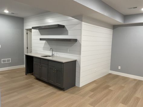 Clean, simple walkup wet bar with shiplap accent walls and floating shelves. #thebasementsanctuary #wetbar #basementdesign #basementbar #rennovation #finishedbasement Bar With Shiplap, Shiplap Accent Walls, Shiplap Accent Wall, Basement Bar, Basement Design, Wet Bar, Accent Walls, Finishing Basement, Floating Shelves