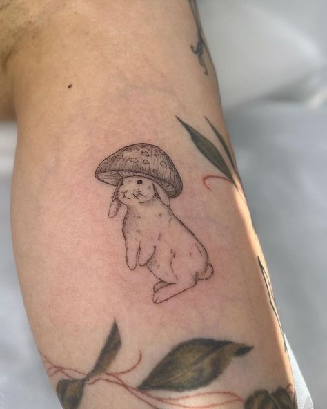 Little bunny with mushroom hat 🥹🍄 Thank you so much @shiny_monster ! This was such a cute concept & it was great seeing you again!… | Instagram Girly Arm Tattoos Sleeve, Bunny Mushroom Tattoo, Fairy Bunny Tattoo, Small Tattoos Mushroom, Fine Line Mushroom Tattoo, Whimsical Tattoo Ideas, Peter Rabbit Tattoos, Critter Tattoo, Tattoo Whimsical