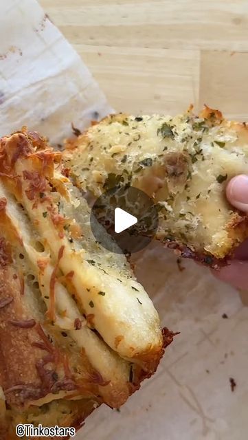 TinkoStars on Instagram: "Craving something savory and cheesy? This Garlic Pull-Apart Bread is perfect for garlic lovers! 🧄✨ Each piece is loaded with roasted garlic, buttery goodness, and melty mozzarella. It’s the ultimate comfort food! 🍞🧀 Follow these steps to create a crowd-pleasing bread at home. Full recipe below ⬇️.

Recipe:
Ingredients:
- 12-15 garlic cloves, peeled
- 1/4 cup olive oil
- Salt and pepper, to taste
- 1 stick of butter, softened
- 2 tbsp fresh parsley, chopped
- Store-bought or homemade pizza dough (about 1 lb) (Pillsbury)
- 1 1/2 cups shredded mozzarella cheese

Instructions:
1️⃣ Preheat your oven to 375°F (190°C).
2️⃣ Place the garlic cloves in an oven-safe dish. Drizzle with olive oil, season with salt and pepper, and cover with foil. Roast for 45 minutes to 1 h Bread At Home, Homemade Pizza Dough, Pull Apart Bread, Recipe Ingredients, Ultimate Comfort Food, Pull Apart, Shredded Mozzarella, Homemade Pizza, Roasted Garlic