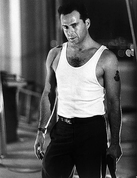 Bruce Willis as John McClane - Die Hard (1988) behind the scenes Die Hard 1988, John Mcclane, Hard Photo, White Vest, Lights Camera Action, Bruce Willis, Die Hard, Film Stills, Gucci Men