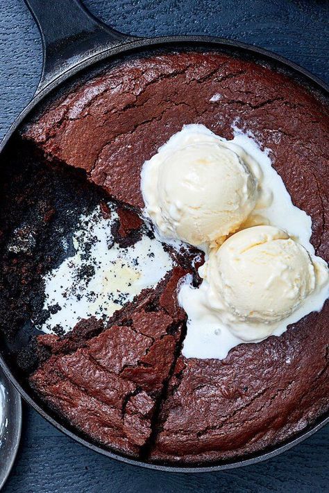 These brownies take on a deliciously smoky flavor on the grill from “baking” in a skillet set over hot coals. After you’re done grilling dinner, prepare to make brownies on the grill by adding a few more lumps of charcoal to maintain a grill temperature of around 350°F.#dessertrecipes #dessertideas #dessertdishes #dessertinspiration #sweettreats #brownies #brownierecipes #homemadebrownies Skillet Brownie, Hot Coals, Grilled Desserts, Grilled Dinner, Homemade Brownies, Campfire Cooking, Dessert Dishes, Desserts Recipes, On The Grill