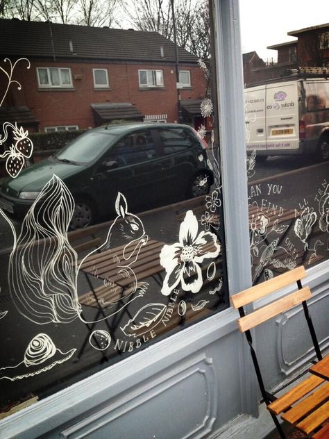 Hand-painted Easter window for Cocoa Cabana in West Didsbury (in homage to Nathalie Lete & Anthropologie) Autumn Window Drawing, Easter Window Painting Ideas, Autumn Window Art, Autumn Window Painting, Shop Window Art, Easter Window, Autumn Window, Painted Window Art, Christmas Window Painting