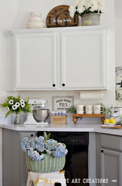 How To Decorate Above Kitchen Cabinets Farmhouse, Kitchen Shelf Decor Farmhouse Style, What To Put Above Kitchen Cabinets, Styling Above Kitchen Cabinets, Above Cupboard Decor, Over Cabinet Decor, Top Kitchen Cabinets Decor, Camelot Art, Cabinet Decor Ideas