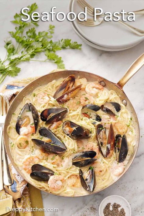 Ready in under 30 minutes, this Seafood Pasta is simple to make and packed with indulgent flavors. Delicious shrimp, scallops, mussels, and perfectly al dente linguine are bathed in a rich, creamy sauce and topped with shredded parmesan cheese. It is an easy recipe that will satisfy your seafood cravings and make any occasion feel special! Mussels Recipe Pasta, Pasta With Mussels, Seafood Cravings, Creamy Seafood Pasta, Mussels Pasta, Seafood Soups, Cold Pasta Dishes, Creamy Seafood, Scallop Pasta