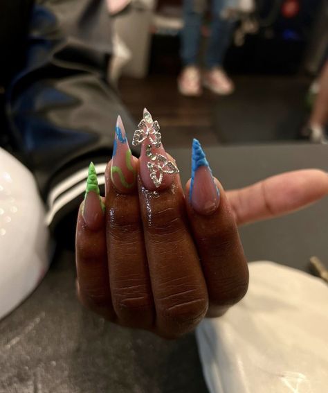 Dm to book! IG: Nailzbyy.niya Stiletto nails, frenchtip nails, butterfly nail charms, abstract nails, green nails, blue nails, acrylic nails, nails Blue And Green Nails Ideas, Green And Blue Nails, Blue And Green Nails, Blue Nails Acrylic, Nails Butterfly, Abstract Nails, Nails Green, Stiletto Nails Designs, Nails Blue