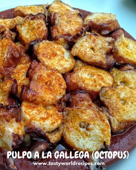 Pulpo a la Gallega (Galician Octopus)
Ingredients:

2 lb octopus (cleaned)
4 potatoes (sliced)
2 tbsp paprika
4 tbsp olive oil
Salt to taste 
#SpanishFood #Paella #Tapas #TortillaEspañola #Gazpacho #Churros #JamonIberico #Croquetas 
#PulpoAGallega #MediterraneanCuisine Galician Octopus, Gazpacho, Octopus, Olive Oil, Salt