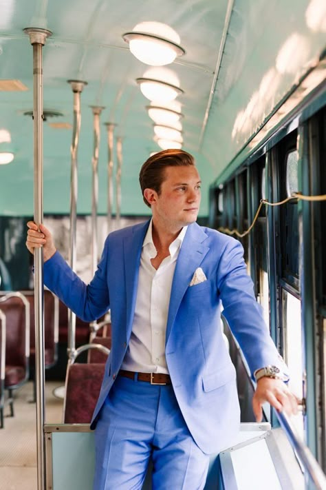 A dapper groom in a bright blue and crisp white suit for an urban chic streetcar wedding | image by Laura Rowe Photography #contemporarywedding #eclecticwedding #streetcarwedding #weddingphotoinspiration #weddingphotoideas #weddingphotoinspiration #groom #groomstyle #groomportrait #groomattire #groomapparel #groominspo #groominspiration Bright Groom Suit, Bright Blue Wedding Suit, Grooms Blue Suit Wedding, Bright Blue Groom Suit, Bright Blue Suit Wedding, Bright Blue Suit Men, Fun Groom Suit, Light Blue Grooms Suit, Bright Suits For Men