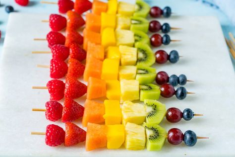 Make these Creative Rainbow Fruit Skewers for Summer Fun! - Clean Food Crush - Clean Food Crush Fun Fruit Skewers, Sweet Kabobs, Short Fruit Skewers, Fresh Fruit Kabobs Skewers, Rainbow Veggie Skewers, Fruit Arrows Skewers, Fruit Skewer, Rainbow Fruit Skewers, Fruit Shapes