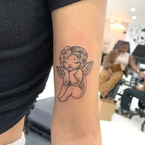 Little Girl Angel Small Fine Line Tattoo Idea & Design on Woman Bicep Little Girl Angel Tattoo Done At Girl Angel Tattoo, Small Fine Line Tattoo, Nyc Tattoo, Fine Line Tattoo, Line Tattoo, Line Art Tattoos, Angel Tattoo, Union Square, Idea Design