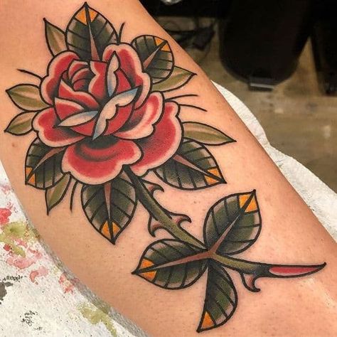 American Traditional Tattoos: History, Meanings, Artists & Designs Trad Rose, American Traditional Rose, Old School Rose, Traditional Tattoo Inspiration, Traditional Tattoo Flowers, Traditional Rose, Traditional Tattoo Sleeve, Tattoo Flowers, Traditional Roses