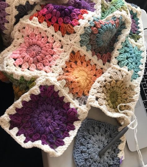 The Queen Size Granny Square Blanket! Yes, it was a lot of work, but also yes, it’s beautiful 😍 Cozy up in this blanket made with 156 meticulously made granny squares! A vibrant piece of art. Perfect for adding warmth and charm to your home. Bohemian Quilt, Granny Square Blanket, Square Blanket, Piece Of Art, Beautiful Blankets, Granny Squares, Queen Size, The Queen, Granny Square