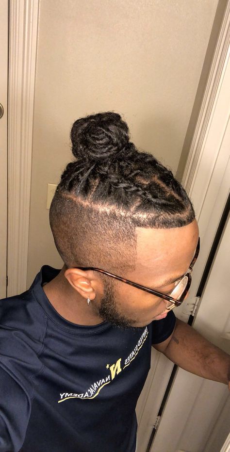 Braided dreadlocks with bun. Locs With Shaved Sides Men, Dread Men, Dreadlock Fade, Dreads Art, Lock Hairstyles, Man Braids, Bun Braids, Viking Hairstyles, Braided Man Bun