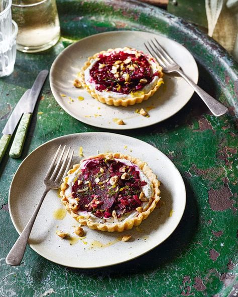 Goat’s cheese, marinated beetroot and hazelnut tarts | delicious. magazine Tartlet Recipes, Beetroot Carpaccio, Vegetarian Dinner Party, Beetroot Recipes, Goat Cheese Tart, Vegetarian Main Course, Cheese Pastry, Goats Cheese, Cheese Tarts