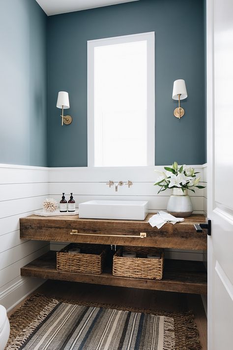 Farmhouse Bathroom features shiplap wainscoting and a custom floating vanity made out of reclaimed wood Bathroom features shiplap wainscoting and a custom floating vanity made out of reclaimed wood #bathroom #shiplap #wainscoting #shiplapwainscoting #floatingvanity #reclaimedwood #reclaimedwoodvanity #reclaimedwoodfloratingvanity Coastal Farmhouse Home, Makeover Kamar Mandi, Home Bunch, Cottage Bathroom, Guest Bathrooms, Farmhouse Home Decor, Floating Vanity, Coastal Farmhouse, Wood Bathroom