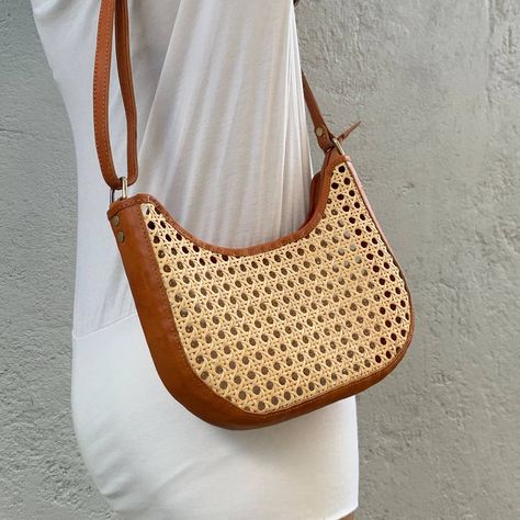 Handmade rattan cane and genuine leather shoulder bag; perfectly compliments any style for a stylish and chic look! - Wholesale orders are welcomed with special prices. - For retail purchase please visit the click on our bio. - #handmadebags #rattanbags #handmadebagsupplier #leatherbags #slingbag #wickerbags #bagswholesaler Rattan Cane, Dumpling Bag, The Click, Leather Sling Bag, Wicker Bags, Handmade Accessories, Handmade Bags, Sling Bag, You Bag