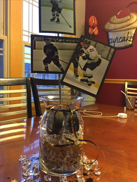 Hockey centerpieces Hockey Crafts For Kids, Hockey Party Decorations, Hockey Centerpieces, Hockey Decorations, Hockey Banquet, Baseball Banquet, Hockey Birthday Parties, Hockey Crafts, Banquet Centerpieces