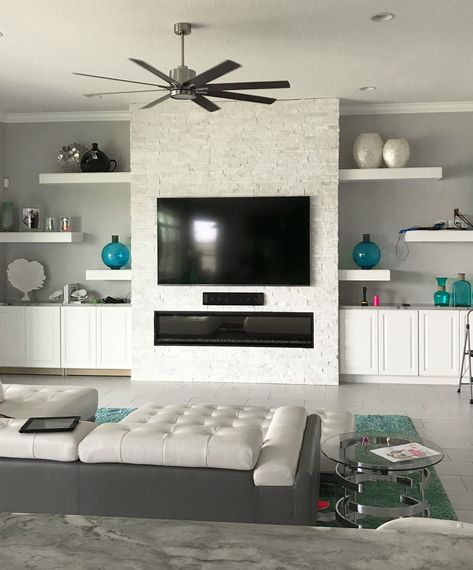 White Stacked Stone Fireplace - Summer 2019 Trend Fireplace Accent Wall With Shelves, 2023 Stone Fireplace Trends, Siting Room Ideas, White Stacked Stone Fireplace, 2023 Living Room Trends, White Stacked Stone, Long Fireplace, Fireplace Upgrade, Styled Living Room