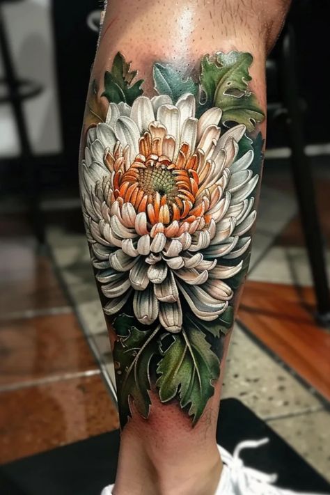 Detailed chrysanthemum flower tattoo with realistic shading on a person's calf. Spidermum Flowers Tattoo, Crythanthimum Flowers, Chyrasantemum Tattoo, Neo Traditional Chrysanthemum, Trisha Tattoo, Chrysanthemum Tattoo Sleeve, Tattoos In Japanese, Chrysanthemums Tattoo, Japanese Chrysanthemum Tattoo