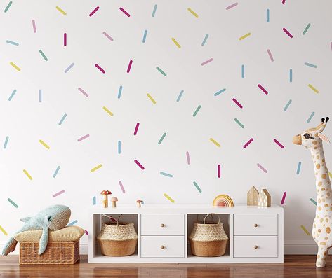 Beautiful multicolour sprinkle/confetti wall stickers. The best way to add colour to your walls in minutes! 
  Simply peel & stick to apply. Pack contains 120 colourful confetti wall stickers. 
 Easy to apply, removable, affordable. Perfect nursery wall decal stickers for rented properties. 
 SIZING 
Each multicolour sprinkle measures 1.8 cm x 6.5 cm. The pack contains a range of pastel colours, from pink and blue, to green and purple. You will receive 6x A5 sheets per pack of sprinkle wall Nursery Boy, Confetti Wall, Cheap Vinyl, Sign Maker, Nursery Colors, Wall Decal Sticker, Bedroom Green, Nursery Wall Decals, Sticker Wall Art