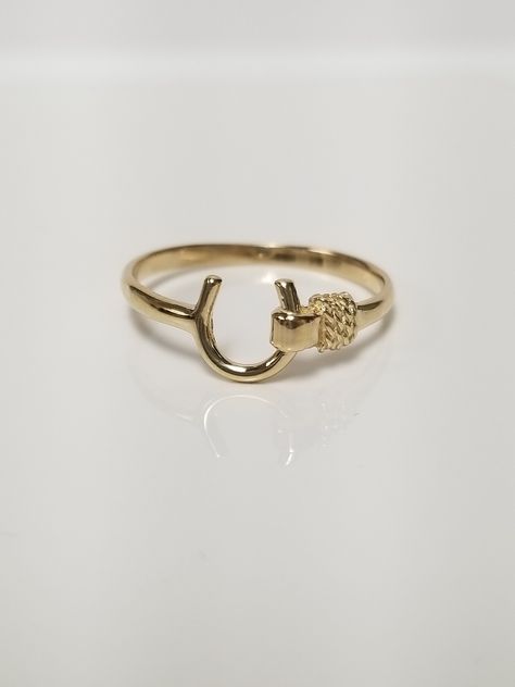 "Thanks for shopping our vintage estate store. We tend to sell well below wholesale and truly hope you enjoy all of our items. Many of the items are one of a kind, so please enjoy scrolling through the pictures and hopefully something will catch your eye. Brown spots are from reflections. Estate 14k yellow gold horseshoe rope rodeo good luck ring.  Ring size: 7.25 Setting: 1/4\" 7mm Band width: 1.5mm Weight: 1.41 grams Beautiful ring, sweet little ring. Marked 14k." Simple Western Rings, Gold Horseshoe Ring, Western Gold Jewellery, Gold Western Jewellery, Cowgirl Rings, Western Rings, Horseshoe Jewelry, Horse Ring, The Bling Ring