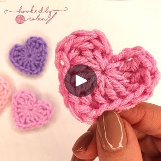 33K views · 2.1K reactions | How to Crochet a Heart in just 2 MINUTES! ❤ | crochet | Need a super fast crochet heart pattern? Then look no further! This very simple and small crochet heart applique can be used for all sorts! | By Hooked by Robin | Everybody and welcome to my channel. Today I'm going to be showing you how to crochet these super easy, super fast, tiny crochet hearts. So you can use any yarn and any hook size to make these hearts. Please note the thicker the yarn and the bigger the hook size the larger your heart will be. So with your yarn we're going to form a magic ring. Now if you don't know how to do a magic ring I do have a tutorial with a slow mo version on my channel which I have linked to in the description box below. So from your magic ring we're going to go ahead an How To Crochet A Heart, Small Crochet Heart, Crochet Heart Applique, Hooked By Robin, Crochet Tags, Crochet A Heart, Fast Crochet, Tiny Crochet, Crochet Hearts