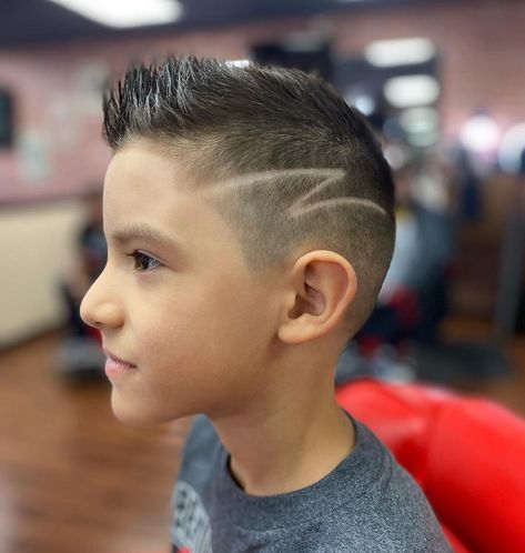 25 Faux Hawk Hairstyles for Boys to Steal The Limelight Boys Faux Hawk, Faux Hawk Haircut, Hawk Haircut, Boys Mohawk, Fohawk Haircut, Boys Haircuts With Designs, Curly Faux Hawk, Hairstyles For Boys