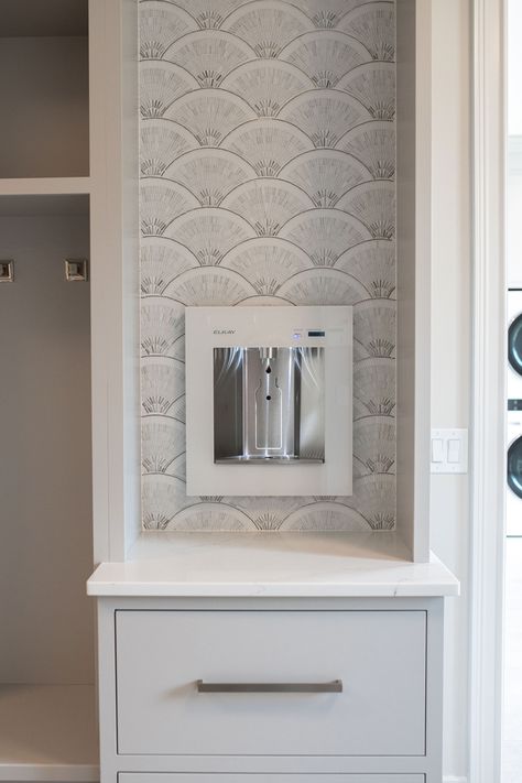 Check out this automatic water bottle filler, just one of the many smart features we built into the home! We also installed automatic toilets 🤫😉 #ohiocustomhomes #clevelandbuilders #oterohomescle #luxuryhomes #luxurycustomhomes #otero #clevelandhomebuilders #mudroom #bottlefiller Built In Water Bottle Filler, Built In Water Cooler, Water Bottle Filler In House, Water Filler Kitchen, Built In Water Dispenser, Water Bottle Filling Station Home, Water Bottle Station, Built In Water Dispenser Cabinet, Water Dispenser Ideas Kitchens