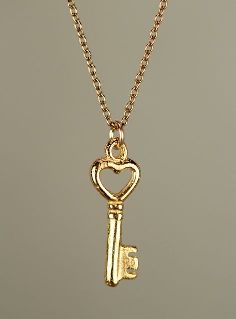 Gold key necklace, key to my heart, tiny key necklace, heart key lock, a dainty 14k gold vermeil skeleton key on a 14k gold filled chain This perfectly cute and tiny 14k gold vermeil heart skeleton key hangs happily from a 14k gold filled chain in the length of your choice! The key measures 16mm x 6mm and is also available in sterling silver :) Looking for other charm necklaces? https://www.etsy.com/shop/BubuRuby?section_id=12318467 More from Bubu Ruby? https://www.etsy.com/shop/BubuRuby?ref=si_ Jenna Allard, Key Jewelry Necklaces, Gold Key Necklace, Brides Jewelry, Deodorant Recipes, Fancy Jewelry Necklace, Preppy Jewelry, Gold Key, Heart Key