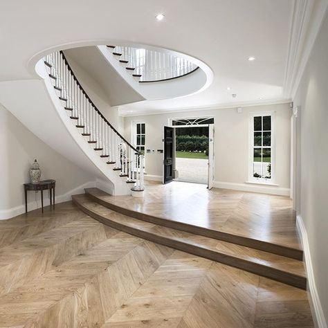 What do you think about this chevron flooring in this impressive hallway? #hall #hallway #stairs #staircase #door #floor #wood #chevron #window #woodwork #finewood #bespokejoinery #joinery #bespokefurniture #design #interior #interiordesign #architecture #home #house #luxe #luxurylife #luxuryinteriors #interior4all #hayburn #hayburnco Sweeping Staircase, Black Front Door, Floor Wood, Herringbone Floor, Entry Hallway, Curved Staircase, Style Goals, Luxury Kitchen Design, Staircase Design